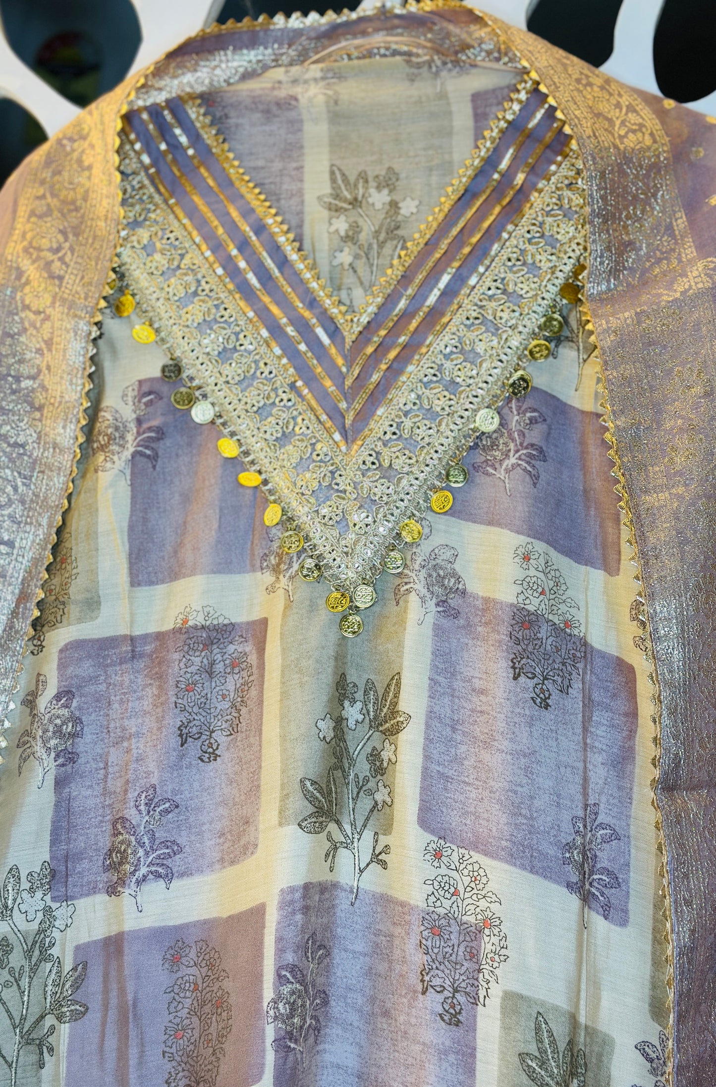 Box Digital Printed Muslin Suit With Beautiful Golden Thread & Tassels
Neck Tie With Self Weaved Georgette Dupatta & Rayon Bottom